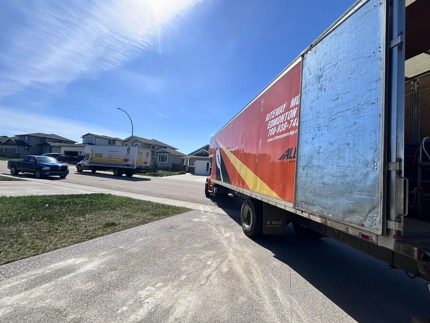 Riteway moving truck on a residential street.
